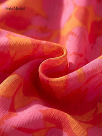 Bente | Lang flydende kjole i pink og orange